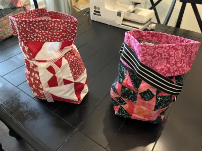 Photo of 2 gift bags made from quilt blocks